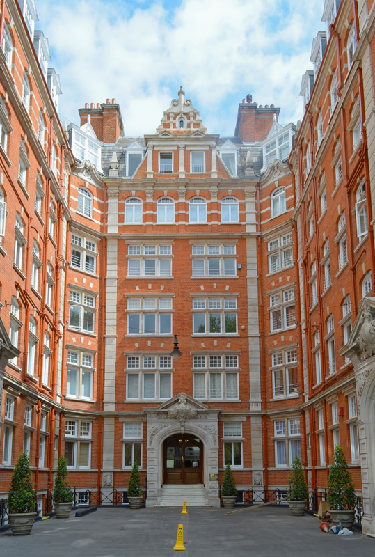 5 - The interior courtyard of Alexandra Court, a late Victorian red-brick mansion block located on Queen's Gate in South Kensington, London